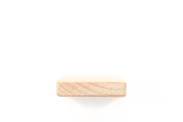 showcase for one item: wooden shelf over white