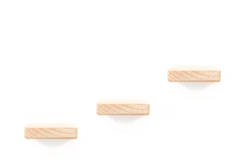 three wooden shelves over white background