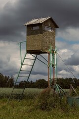 lifeguard tower on the field before storm