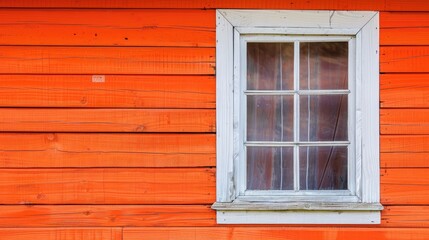 White framed window on orange wooden wall background