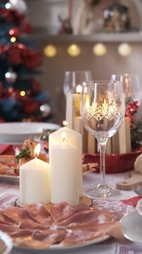 Slow motion video with the focus on Christmas decorations on the table at home