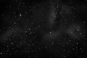 Obraz premium A stained abstract background. White dust and scratches over a black surface.