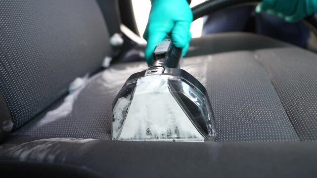 Vacuum Extractor Cleaning Car Seat with Foam