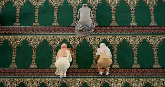 Carpet, prayer and group of women in mosque for spiritual worship, sujood and Islamic religion from above. Culture, respect and Muslim people with gratitude, morning dua and holy faith in meditation