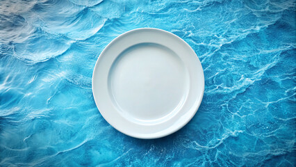 Empty white plate in the center of the image on blue sea background.