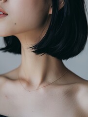 Fototapeta premium Close-up of neck area with collarbone, short hair, natural skin 