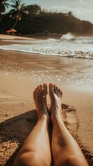 A woman's feet, barefoot in the sand at the beach