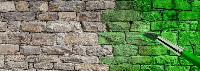 Imganinärer Pinsel malt eine Mauergrün