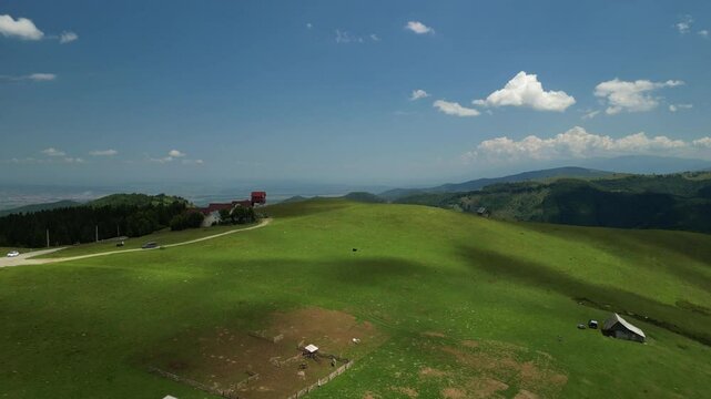 Aerial drone view above the mountain road in Paltinis, in the Carpathian Mountains, Romania.