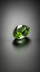 a single peridot crystal is featured on a pure grey ba background