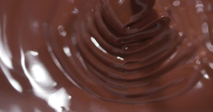 An enticing image showcasing a spiral texture of melting chocolate, suggesting indulgence and culinary artistry