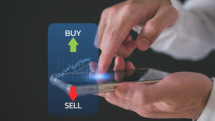 Stock market or forex trading graph and candlestick chart suitable for financial investment concept, businessman using smartphone and computer working with stock market data chart buy and sell