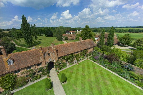 Sissinghurst Castle Garden West Range with oast house buildings in background. Cranbook, Kent, UK - July 31 2013