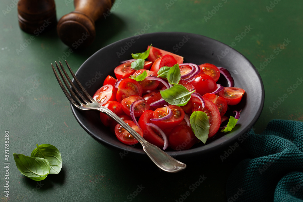 Wall mural healthy tomato salad with onion basil olive oil and balsamic vinegar