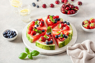 watermelon pizza slices with yogurt and berries, summer dessert