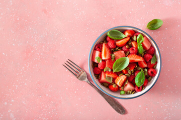 watermelon salad with strawberry raspberry basil seeds. healthy summer dessert