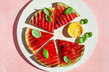 grilled watermelon slices with lemon and basil. summer dessert