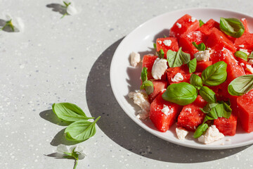 watermelon salad with feta cheese and basil. healthy summer dessert
