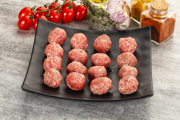 Uncooked raw beef meatball minced