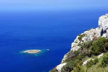 Cyprus.White cliffs over the blue sea