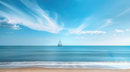 Obraz premium A calm beach with a distant sailboat and space for text.