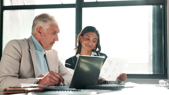 Business, people and laptop in office for training, teaching and learning for skill or career development. Mature man, leader and female employee at workshop with internship program for motivation