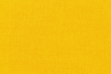Fototapeta premium Yellow linen fabric cloth texture for background, natural textile pattern.