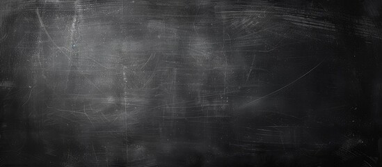 An abstract chalk blackboard texture background with free copy space image for product or advertising design is available.
