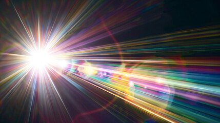 Light with rainbow rays on dark background.
