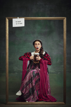 Advertisements for themed bars and restaurants. Elegant young woman in richy dress sitting and drinking foamy lager beer on vintage green background. Concept of history, comparison of eras, remake