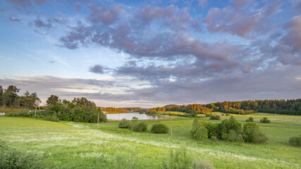 Obraz premium A beautiful, serene landscape with a lake and a forest