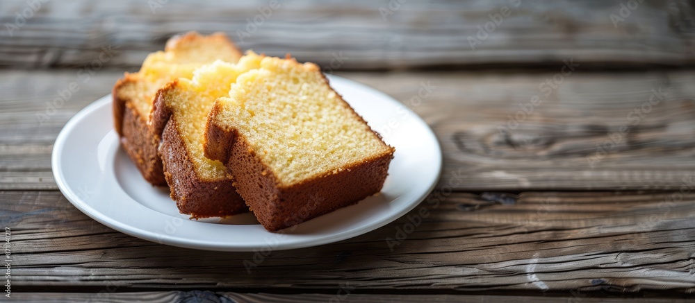 Aufkleber delectable homemade pound or butter cake slices on a white plate, displayed on a rustic wooden table