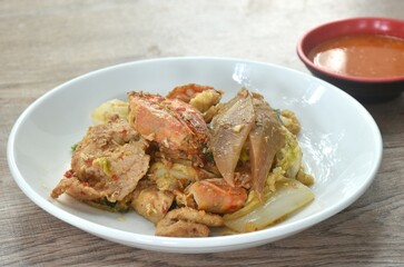 fried glass noodles chicken and pork meat couple crispy pickled squid and shrimp with vegetable on plate dipping sukiyaki sauce