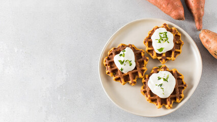 Vegetarian sweet potato waffles with natural yogurt. Healthy food. Copy space