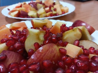 Slice of ripe papaya.Yellow papaya cut into two pieces.A black papaya seed inside a papaya., A black papaya seed inside a papaya slice.,mix cutting sweet fruits pieces 