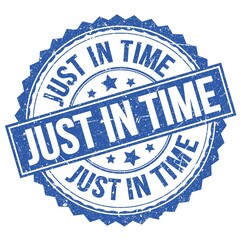 Fototapeta premium JUST IN TIME text on blue round stamp sign