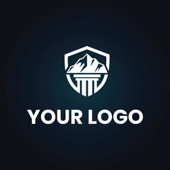 This is a logo of a pillar on a shield with a mountain on top of it in white color on a dark background