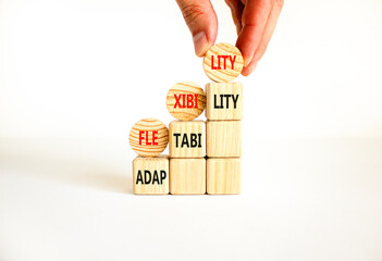 Flexibility or adaptability symbol. Concept word Flexibility Adaptability on beautiful wooden...