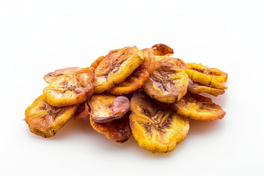 Deep fried under ripe banana slices a staple vegetarian dish for Onam known as ethakka upperi Photographed on white background