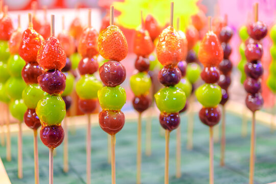 Beautifully arranged sugar-coated grape and strawberry. Tang Hu Lu
