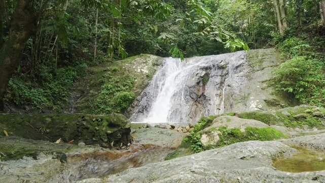 Tropical waterfall. Clear fresh water-Dolly shot. Air terjun. Sungai, Selangor, Malaysia.