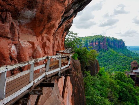 Phu Thok or Wat Chetiyakhiri ,Beautiful mountain landscape and wooden bridges on high rocky cliffs, Bueng Kan Province, Thailand.