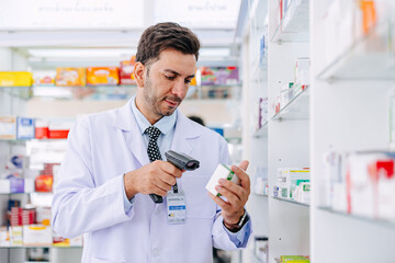 Pharmacist check stock inventory in Pharmacy medicine business. Drugstore employee in medicine shop...