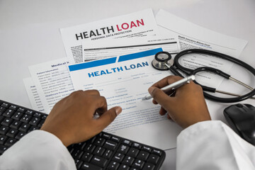 Health loan concept. Medical contract with a stethoscope and keypad close-up.