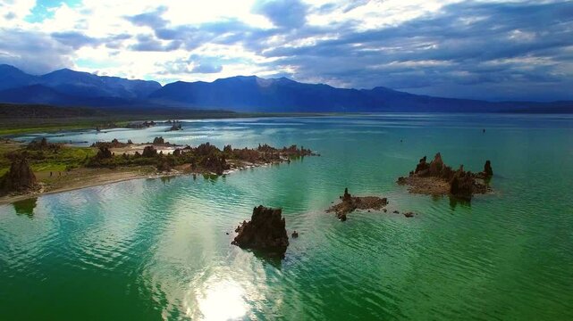 Aerial Panning Scenic Shot Of Stalagmite Rocks By Mono Lake On Sunny Day - Lee Vining, California