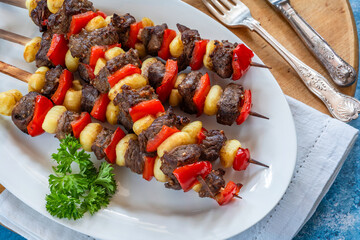 Grilled gnocchi, steak and red pepper skewers