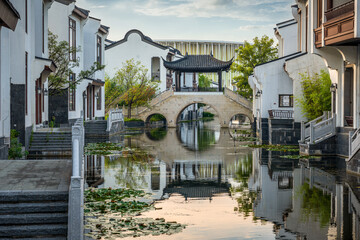 Serene Traditional Town with Reflective Canal