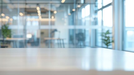 Abstract blurred image of a modern office corridor illuminated by bright ceiling lights, conveying work atmosphere