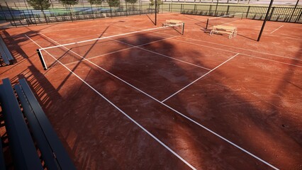 aerial view of Outdoor tennis court with red clay surface include net, lights, spectator seats © WINDERFULL STUDIO