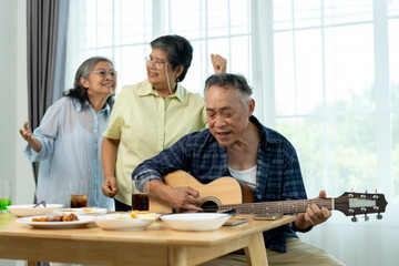 Retired Friends Enjoying Music and Dancing Together